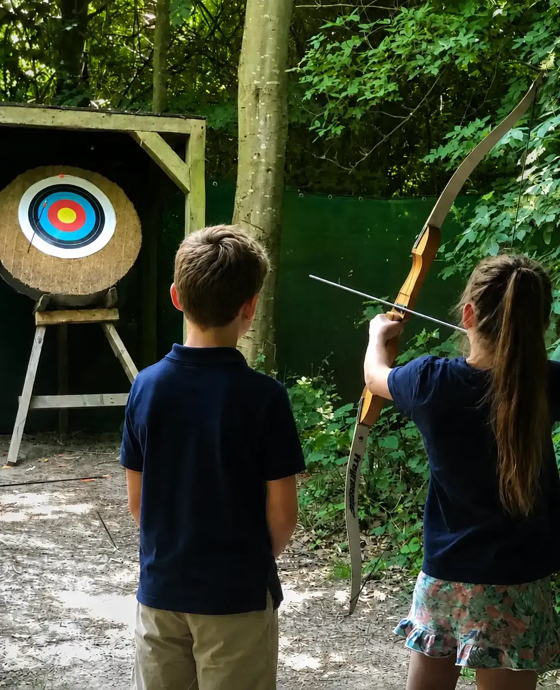 Kinderen leren boogschieten